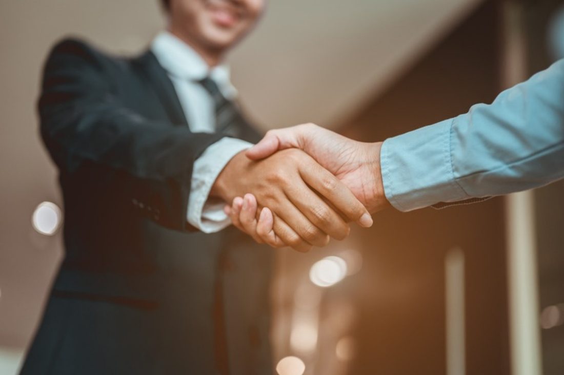 Shaking hands at the City Wide office