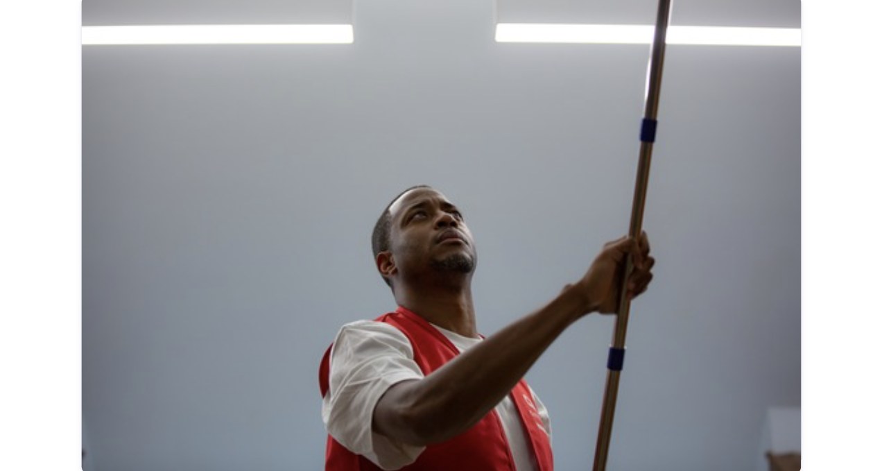 City Wide crew member painting an interior wall